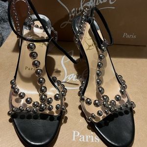 CL authentic heels,worn once does have some protectors on original box&dust bags